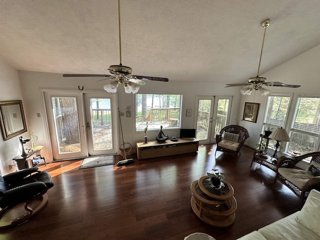 466 Galahad Loop Rd, Woodville, TX 75979 - living room featuring a textured ceiling, a ceiling fan, vaulted ceiling, and hardwood / wood-style flooring