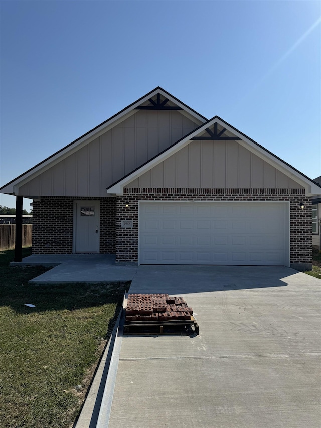 single story home with a garage