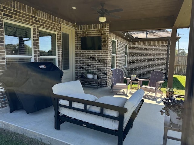 view of patio / terrace with outdoor lounge area, ceiling fan, and a grill