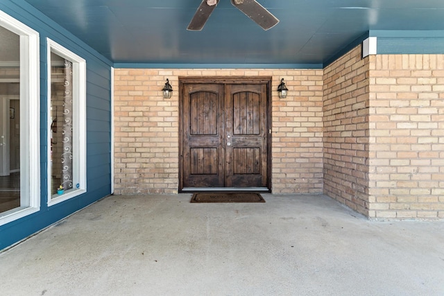 1135 Brandywine St, Beaumont, TX 77706 - doorway to property featuring brick siding and ceiling fan