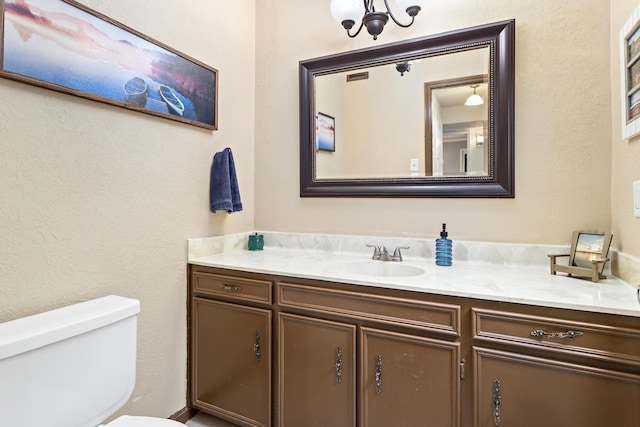 1135 Brandywine St, Beaumont, TX 77706 - bathroom with vanity and a textured wall