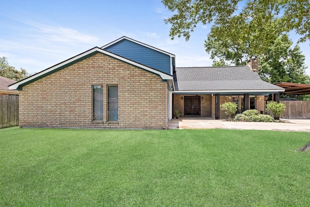 1135 Brandywine St, Beaumont, TX 77706 - view of front of house with brick siding, a chimney, and a shingled roof
