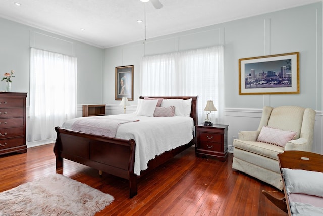 bedroom featuring dark hardwood / wood-style floors and ceiling fan