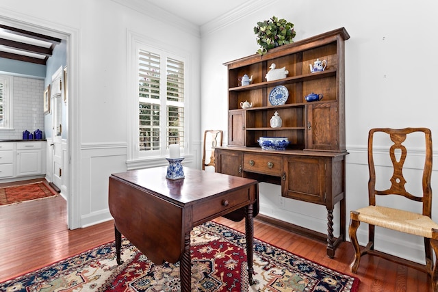 office with hardwood / wood-style floors and crown molding