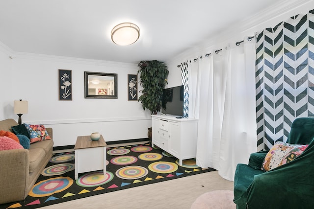 living room with ornamental molding