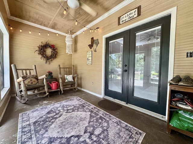15590 S Fm 92, Spurger, TX 77660 - sitting room featuring concrete floors, french doors, and crown molding