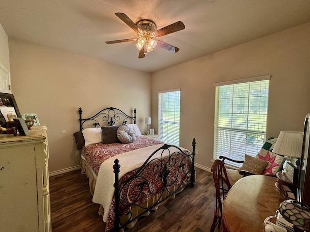 15590 S Fm 92, Spurger, TX 77660 - bedroom featuring wood finished floors and ceiling fan