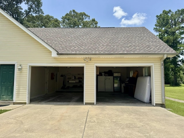 15590 S Fm 92, Spurger, TX 77660 - garage with fridge