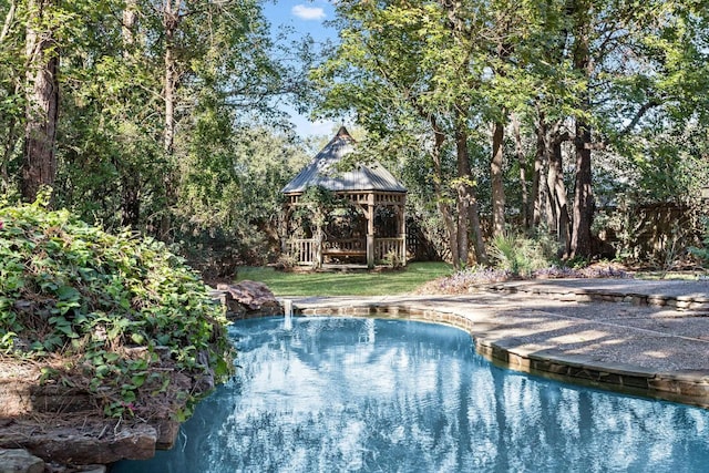 view of swimming pool featuring a gazebo