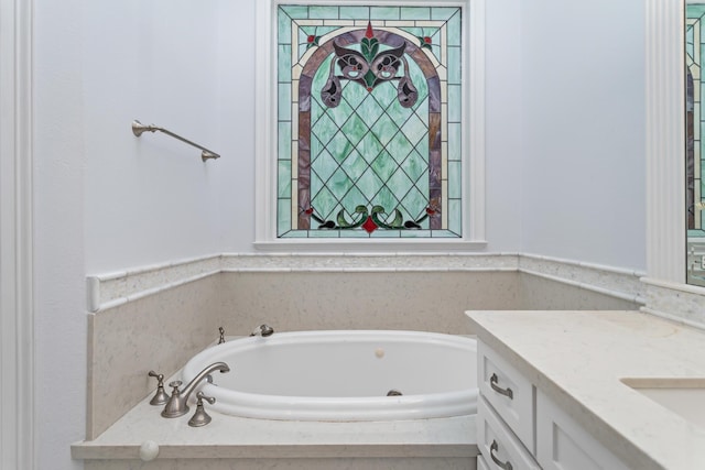 bathroom featuring a bathtub and vanity