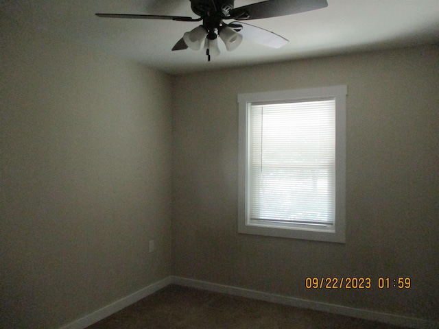 unfurnished room with ceiling fan