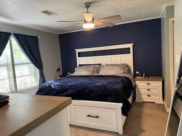 6358 Nick Ave, Port Arthur, TX 77640 - bedroom featuring light colored carpet, a textured ceiling, ceiling fan, and ornamental molding