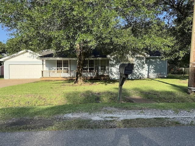 6358 Nick Ave, Port Arthur, TX 77640 - view of front of house with covered porch, an attached garage, a front yard, and concrete driveway