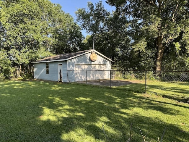 6358 Nick Ave, Port Arthur, TX 77640 - view of yard featuring a detached garage and an outdoor structure