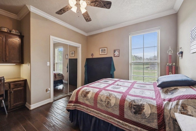 2014 Fish Lk, Kountze, TX 77625 - bedroom featuring crown molding, baseboards, ceiling fan, dark wood-style floors, and a textured ceiling