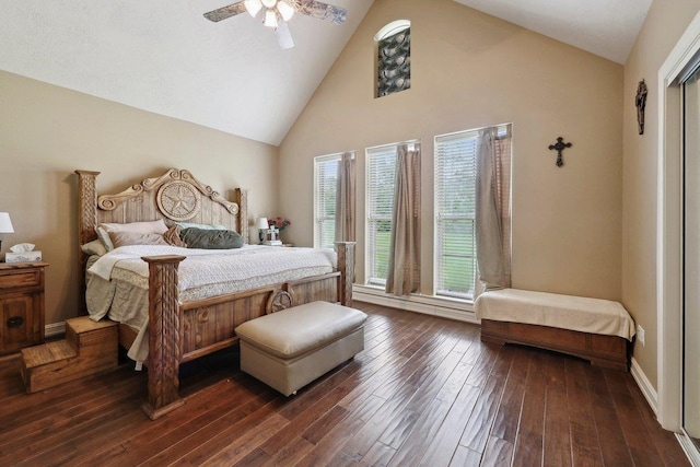 2014 Fish Lk, Kountze, TX 77625 - bedroom featuring a ceiling fan, dark wood finished floors, and high vaulted ceiling