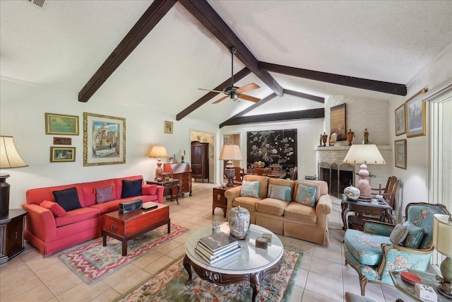 6125 Pinkstaff Ln, Beaumont, TX 77706 - living room with ceiling fan, a textured ceiling, light tile patterned flooring, and a brick fireplace