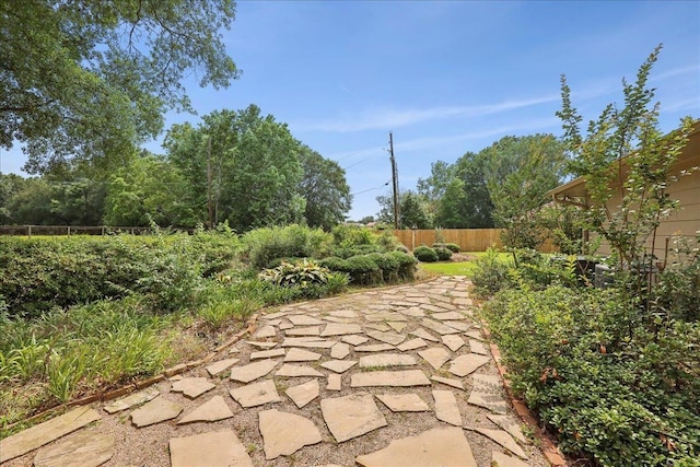 6125 Pinkstaff Ln, Beaumont, TX 77706 - fenced backyard featuring a patio