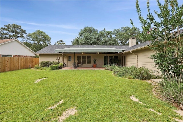 6125 Pinkstaff Ln, Beaumont, TX 77706 - back of house featuring ceiling fan, a patio, a chimney, and roof with shingles