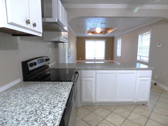 kitchen featuring ornamental molding, wall chimney exhaust hood, stainless steel electric stove, light tile patterned floors, and white cabinetry