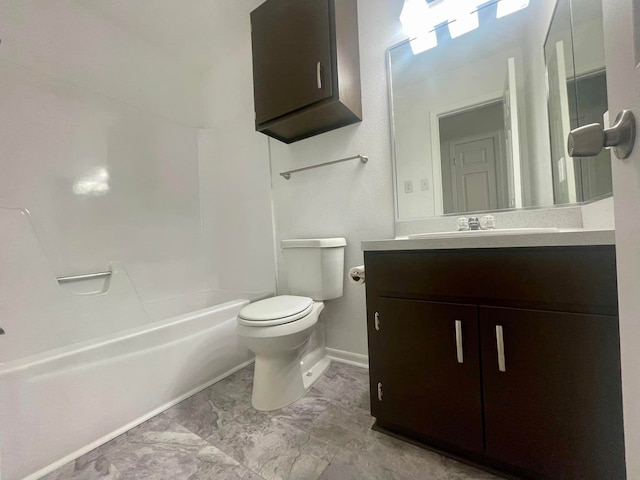 full bathroom featuring vanity, toilet, and  shower combination