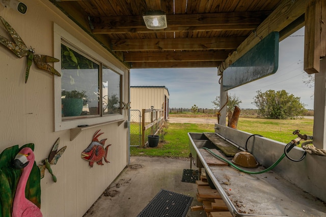 view of patio / terrace with a rural view