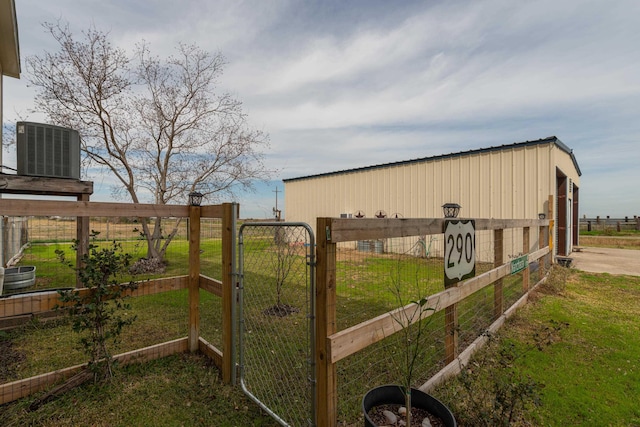 view of yard with central AC