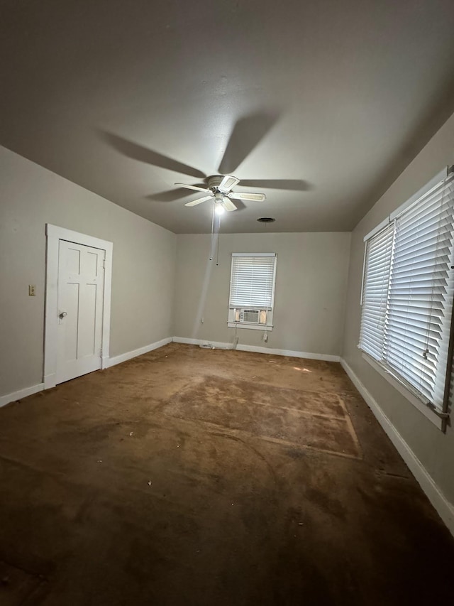 unfurnished room featuring ceiling fan