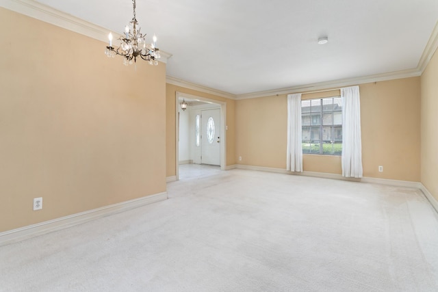 empty room featuring a chandelier, ornamental molding, a wealth of natural light, and light carpet