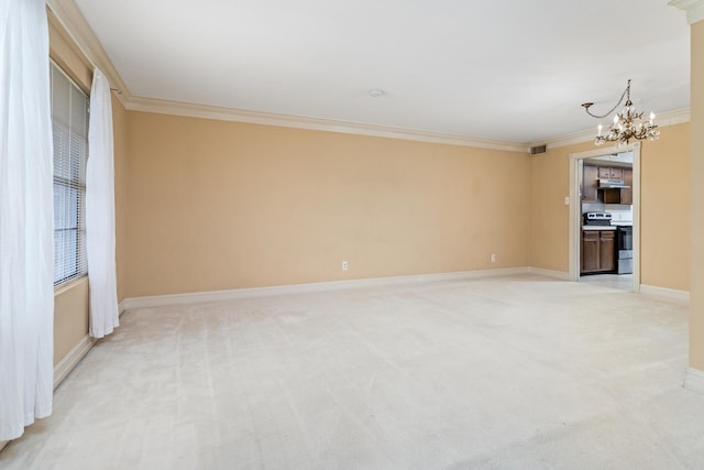 unfurnished living room featuring crown molding, a chandelier, and light carpet