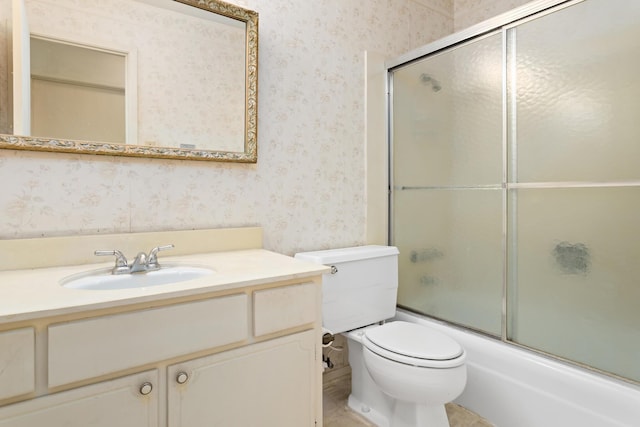 full bath with toilet, wallpapered walls, enclosed tub / shower combo, and vanity