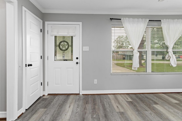 125 Needles, Vidor, TX 77662 - entrance foyer with wood finished floors, crown molding, and baseboards