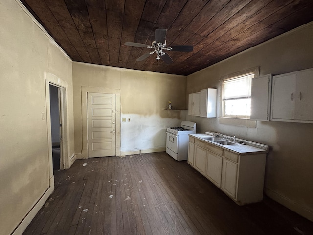 kitchen featuring sink, white range with gas stovetop, dark hardwood / wood-style floors, white cabinets, and wood ceiling
