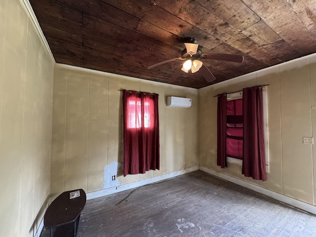 empty room featuring a wall unit AC, ceiling fan, hardwood / wood-style floors, and wooden ceiling