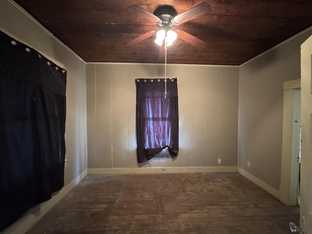 unfurnished room with ceiling fan and wood ceiling