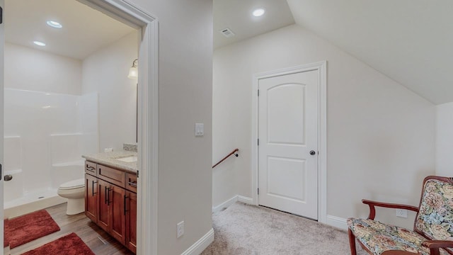 15360 Hercules Dr, Beaumont, TX 77713 - full bath with vanity, a shower, vaulted ceiling, and recessed lighting