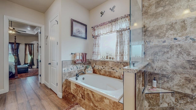 15360 Hercules Dr, Beaumont, TX 77713 - full bath featuring a garden tub, wood finished floors, ensuite bath, a ceiling fan, and a tile shower