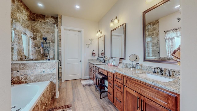 15360 Hercules Dr, Beaumont, TX 77713 - full bath featuring a bath, a shower stall, double vanity, and recessed lighting