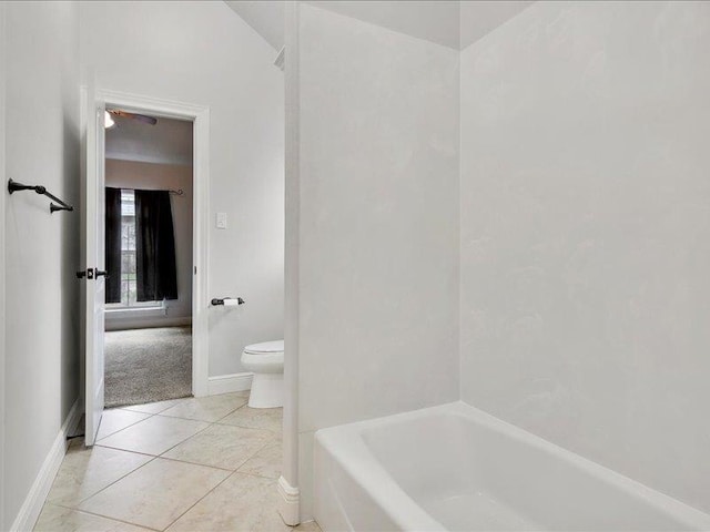 bathroom featuring tile patterned floors and toilet