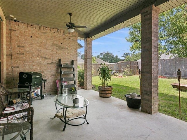 view of patio / terrace featuring ceiling fan and grilling area