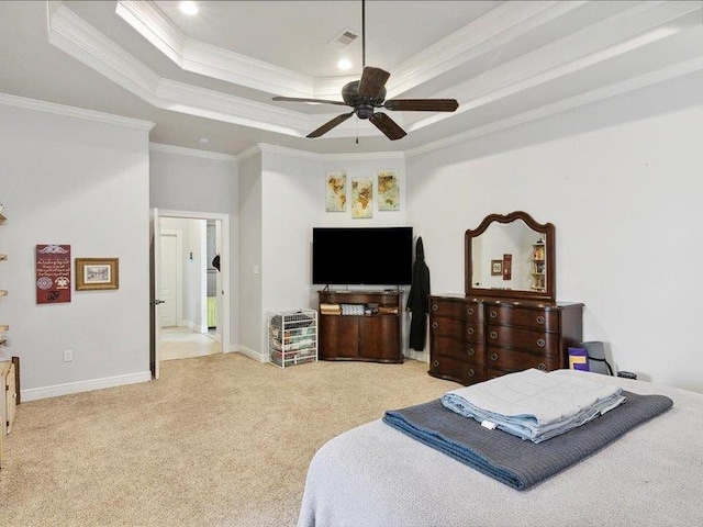 carpeted bedroom with a raised ceiling, ceiling fan, and crown molding