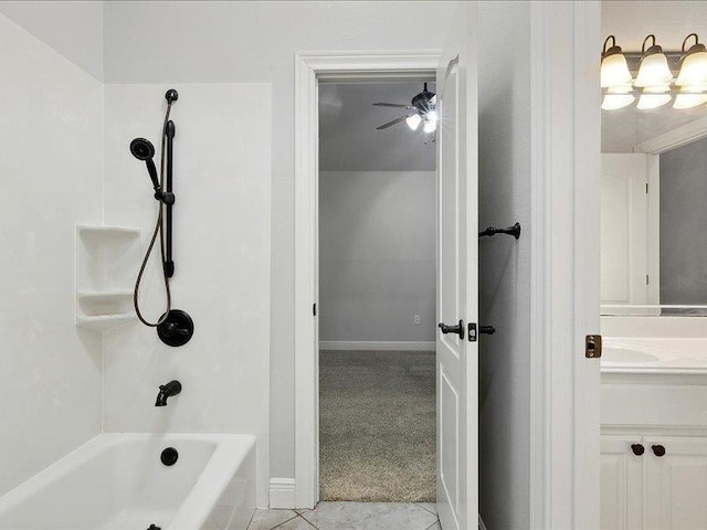 bathroom featuring tile patterned flooring, vanity, bathing tub / shower combination, and ceiling fan