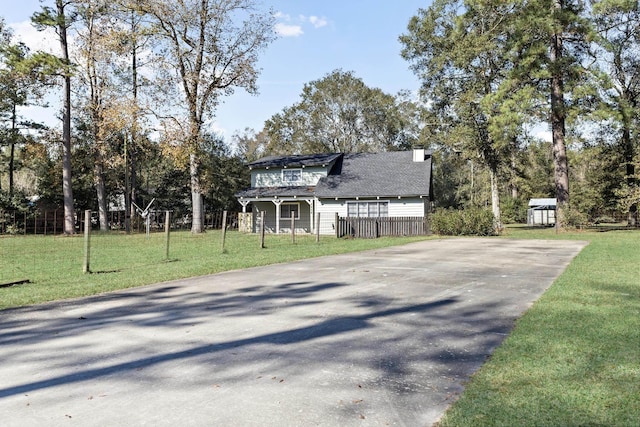 view of front of house with a front lawn