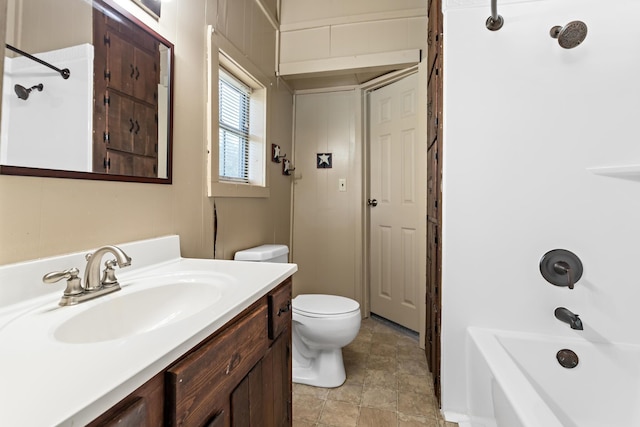 full bathroom featuring shower / washtub combination, vanity, and toilet