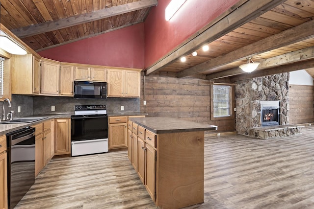 kitchen with beam ceiling, sink, wooden ceiling, a fireplace, and black appliances