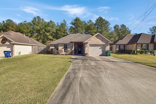 ranch-style house with a garage and a front lawn