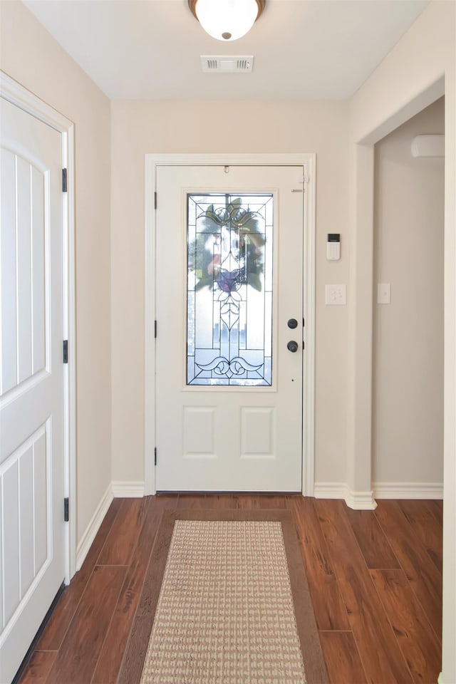 entryway with dark wood-type flooring