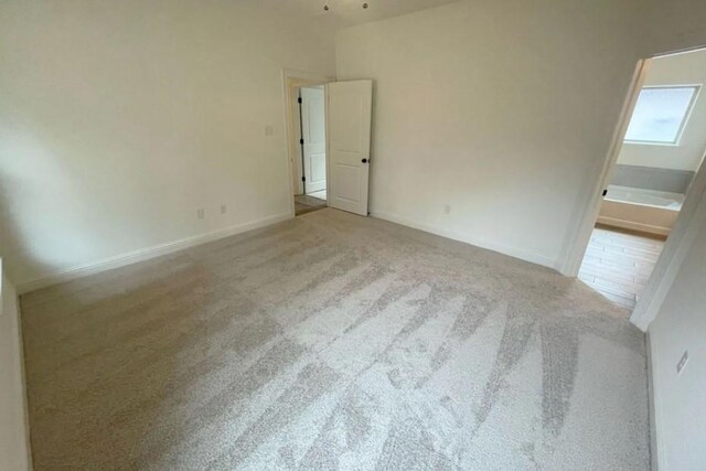 1585 Little Cypress Loop, Orange, TX 77632 - unfurnished room with carpet and baseboards