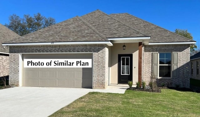 1585 Little Cypress Loop, Orange, TX 77632 - view of front of property with an attached garage, driveway, a shingled roof, brick siding, and a front yard