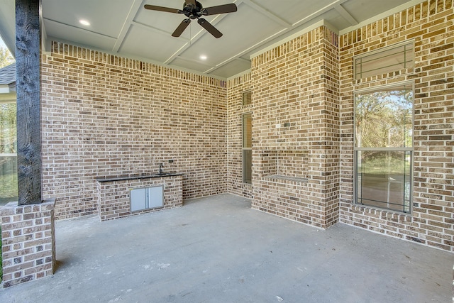 view of patio with ceiling fan